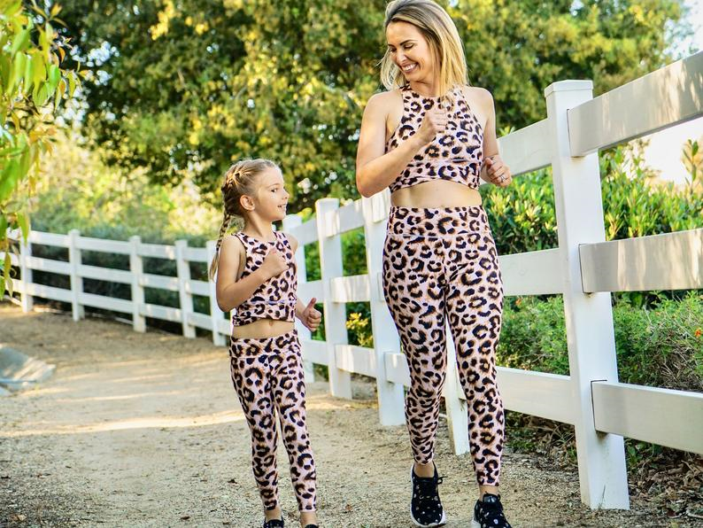 We are so excited to launch our beautiful Mommy & Me matching yoga sets! Each set is handmade in Miami, Florida and is super comfy. Each fit is true to size.   *A set includes printed leggings and matching bra.  All of our prints are stylish, funky and fashionable surely leaving you and your budding yogi to be the talk of the class!   100% polyester