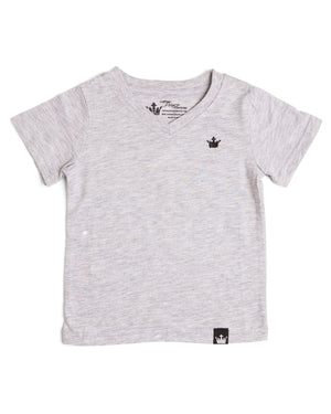 The Littlest Prince Gray Crown Logo Tee is sleek and simple which allows you to style it how you please! You can dress it up with a sports jacket or keep it cool with a pair of jeans. It is a v-neck style which keeps your little man totally stylish. Available in baby, toddler and tween sizes!