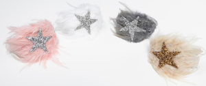 Our Petite Hailey Accessories are stunning! These feather headbands are the perfect touch for your budding fashionista. They match all of our dresses in the collection and come in four colors. The glitter shaped star sits on top of a wide feather extending throughout the headpiece