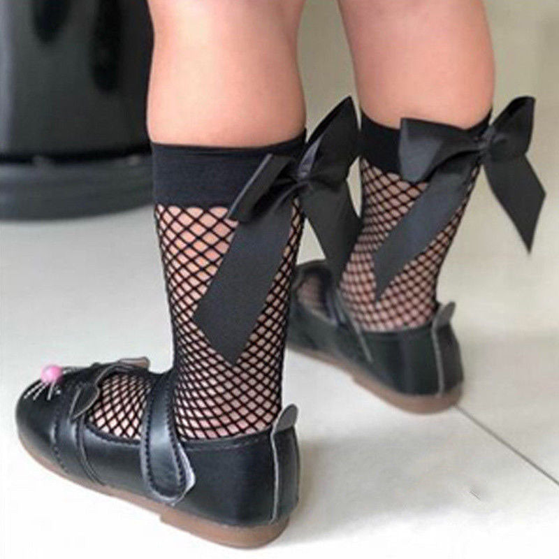 These trendy fish net ankle socks are the perfect addition to any of our causal or classic collections. Depending on the size of your child, these socks can fit our baby diva's (up to calf) or our tween diva's (ankles). Each fish net sock has a big bow on the back.  One size fits all - available in white or black