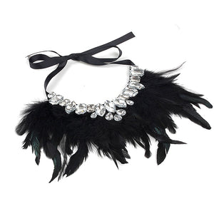 Our Diamond Glitz necklace is stunning!  This makes the perfect addition for our mini diva's all the way up to our mama diva's.This necklace sits high on top of your existing shirt and is lined with Solid black and hints of evergreen long feathers and shining crystals.  Mix and match with your mini for the perfect stylish accessory! 