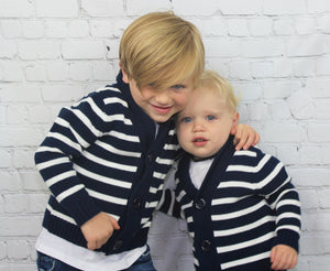 The Nautical baby/toddler boy sweater is a beautiful navy blue heavy knit sweater that will keep your little man nice and toasty. This sweater will fashionably last into winter and can be worn underneath a heavy coat if need be. It looks like a summer Hamptons vibe but will serve it's purpose during those cold winter nights. 