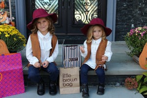 Add this gorgeous wide brim felt hat to all of your Fall styles! We have three colors for your mini fashionista to choose from - red wine, black and beige. We also have the matching hat for mommy too! 