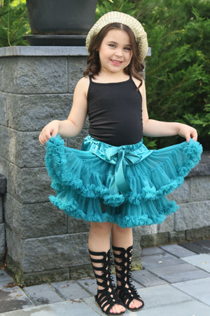 The fluffy tutu petti skirt is everything you want in a tutu. The ruffles are layered giving it a ton of poof! A satin bow lines the front. The color is gorgeous! 