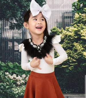 Calling all Boujie Diva's! Our crystal feather necklaces are the perfect addition for our mini diva's all the way up to our mama diva's. Each necklace sits high on top of your existing shirt and is lined with colorful feathers and shining crystals.  Mix and match with your mini for the perfect stylish accessory!  Available in beige, black, red and blue
