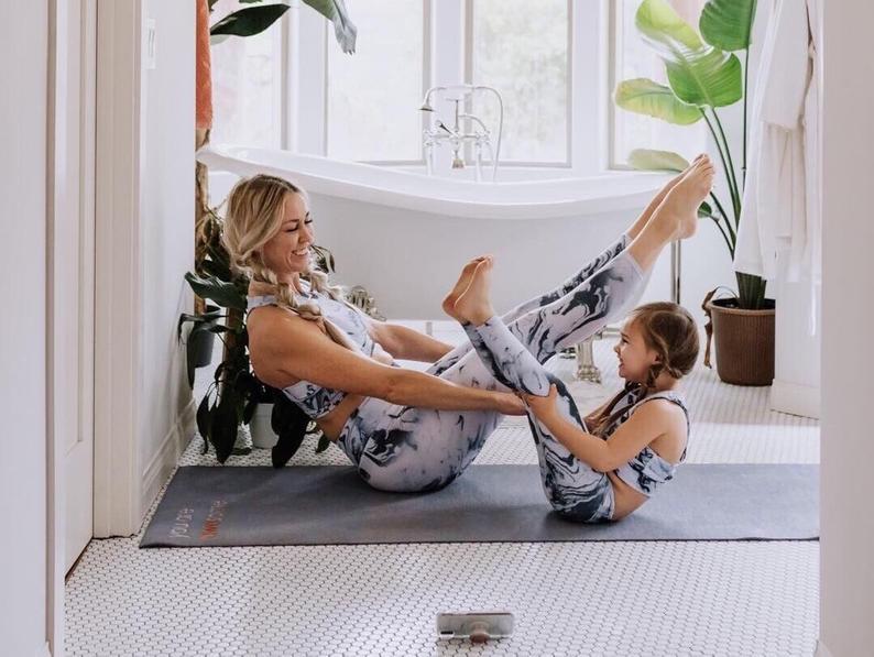 We are so excited to launch our beautiful Mommy & Me matching yoga sets! Each set is handmade in Miami, Florida and is super comfy. Each fit is true to size.   *A set includes printed leggings and matching bra.  All of our prints are stylish, funky and fashionable surely leaving you and your budding yogi to be the talk of the class!   100% polyester