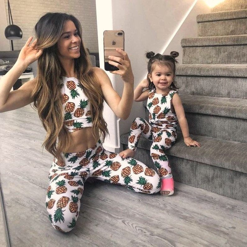 We are so excited to launch our beautiful Mommy & Me matching yoga sets! Each set is handmade in Miami, Florida and is super comfy. Each fit is true to size.   *A set includes printed leggings and matching bra.  All of our prints are stylish, funky and fashionable surely leaving you and your budding yogi to be the talk of the class!   100% polyester