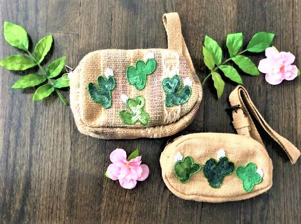 Travel to the beach in style the summer with our new Pricky Bum Bag. Each bag is hand made and has unique detailing including the sparkly sequin cactus patches. The fanny pack style makes it easy with a hands free approach. Perfect for mommy's on the go!  Pairs perfect with our San Pedro jumpsuit and kimono